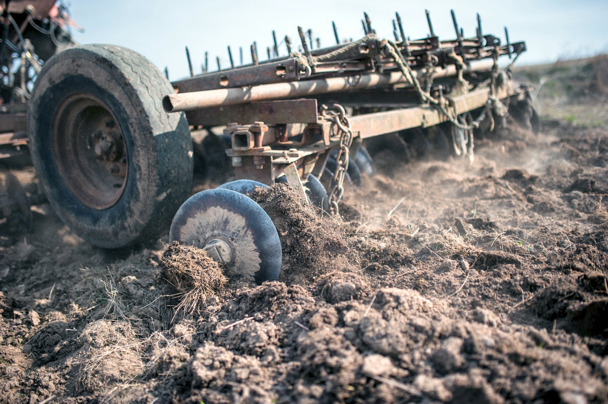 tractor ploughing field background